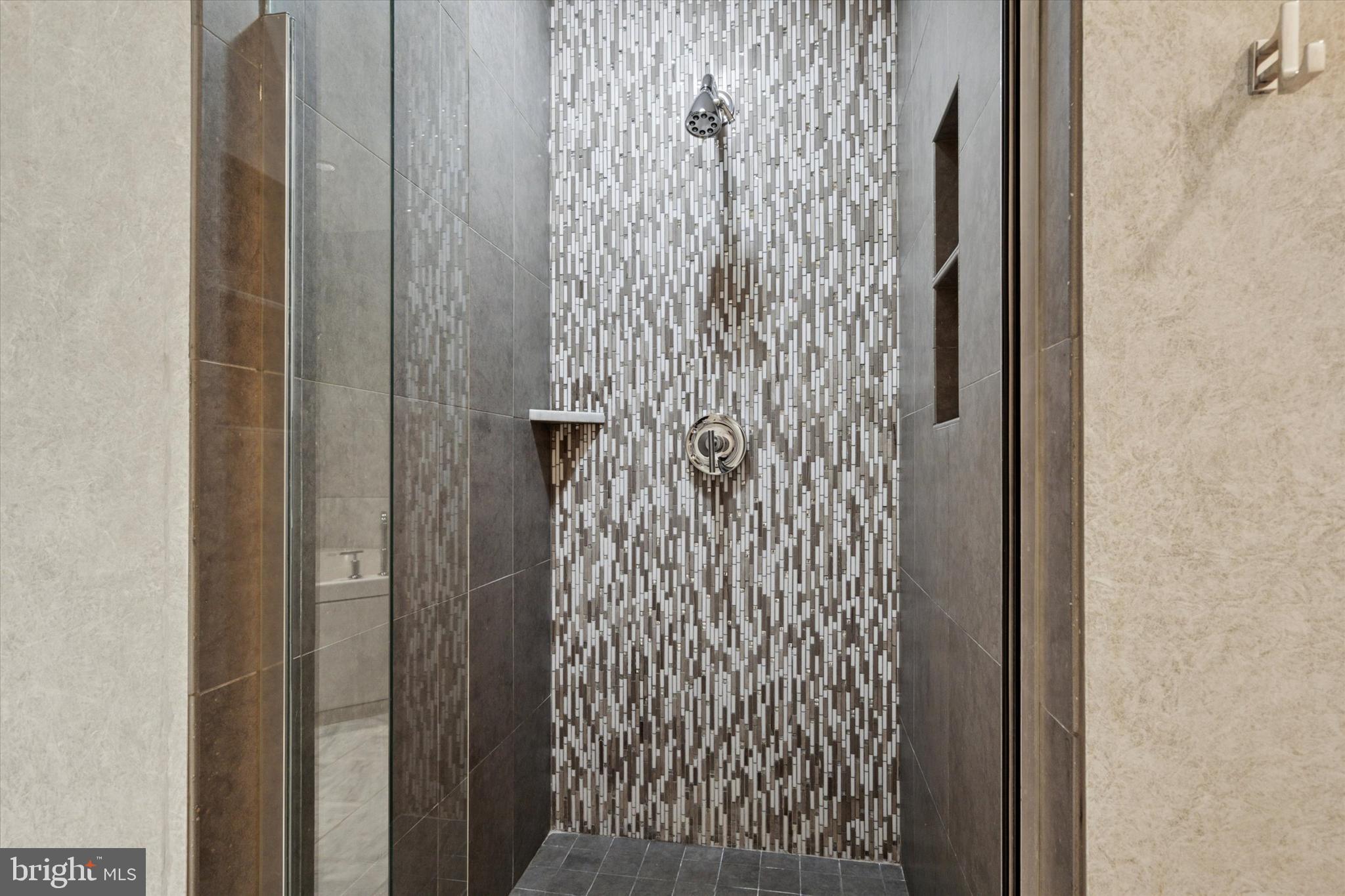 1515 Locust Street, Unit 400 Philadelphia, PA 19102 - Photo 17 of 25 a bathroom with a shower curtain