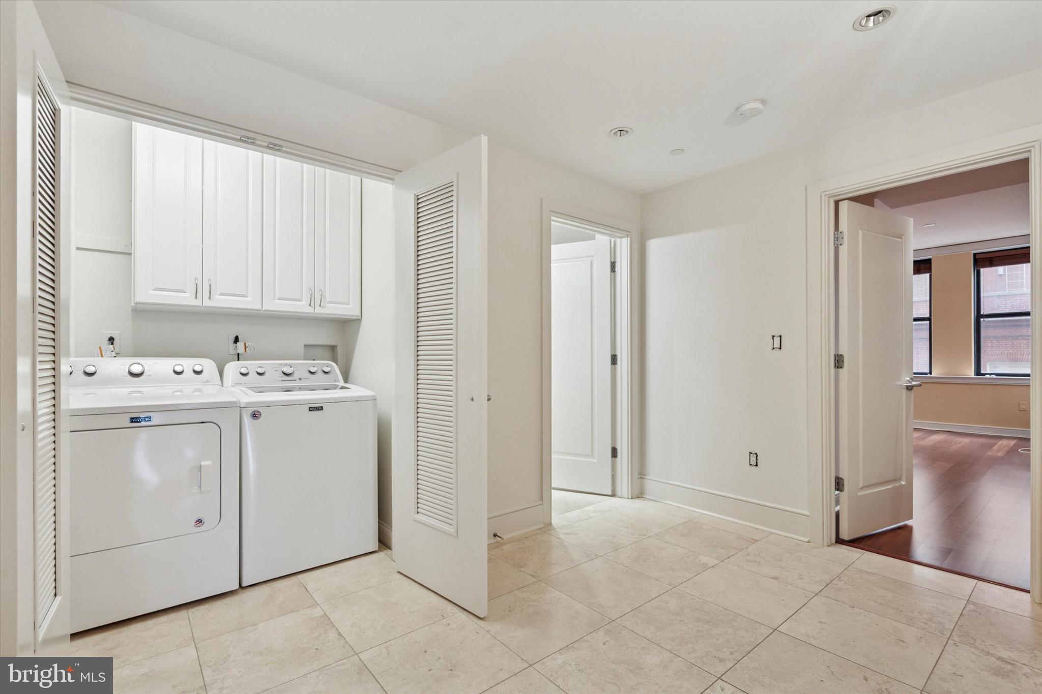 1515 Locust Street, Unit 400 Philadelphia, PA 19102 - Photo 22 of 25 a view of a storage & utility room with closet dryer
