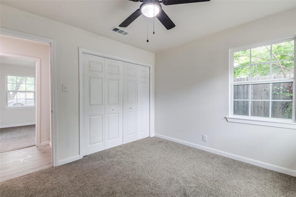 2908 Scottsbluff Drive Dallas, TX 75228 - Photo 15 of 34 an empty room with windows and closet