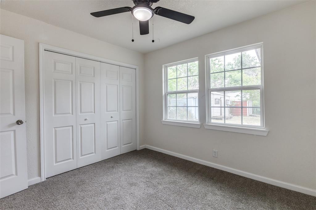2908 Scottsbluff Drive Dallas, TX 75228 - Photo 20 of 34 a view of an empty room with a window