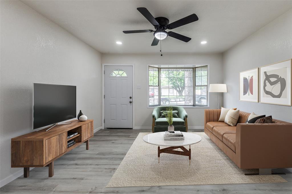 2908 Scottsbluff Drive Dallas, TX 75228 - Photo 2 of 34 a living room with furniture and a flat screen tv