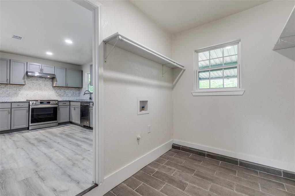 2908 Scottsbluff Drive Dallas, TX 75228 - Photo 9 of 34 a view of kitchen with granite countertop stainless steel appliances sink and cabinets