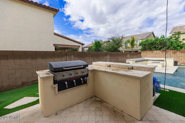 a kitchen with a stove and a microwave oven