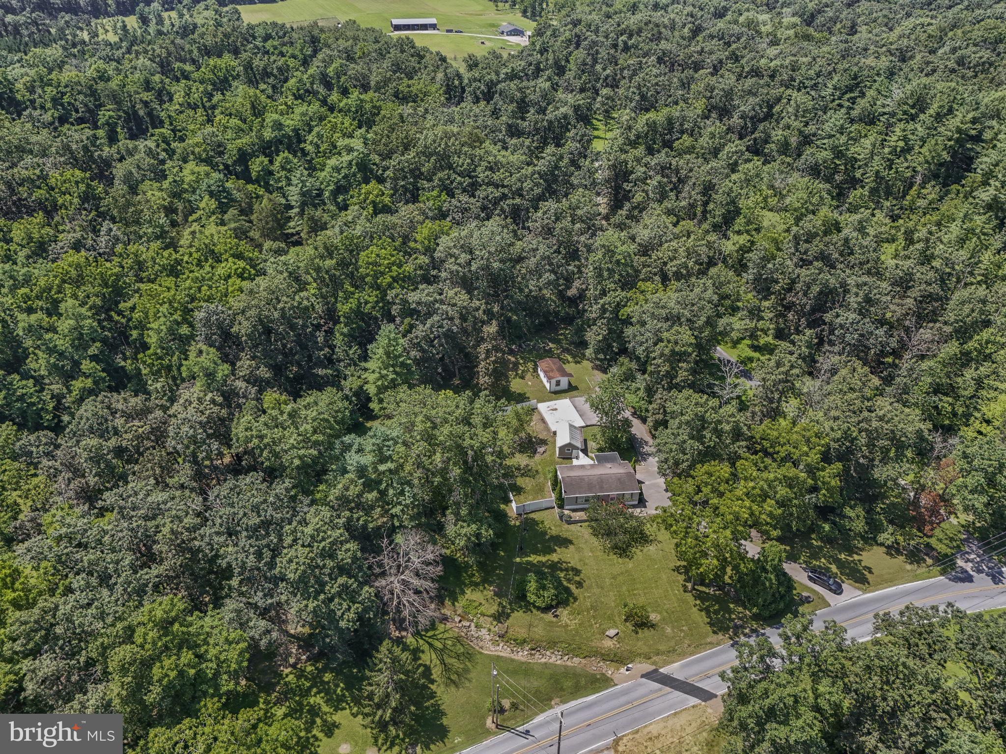 540 Zeigler Road Dover, PA 17315 - Photo 11 of 41 an aerial view of residential house with outdoor space and trees all around