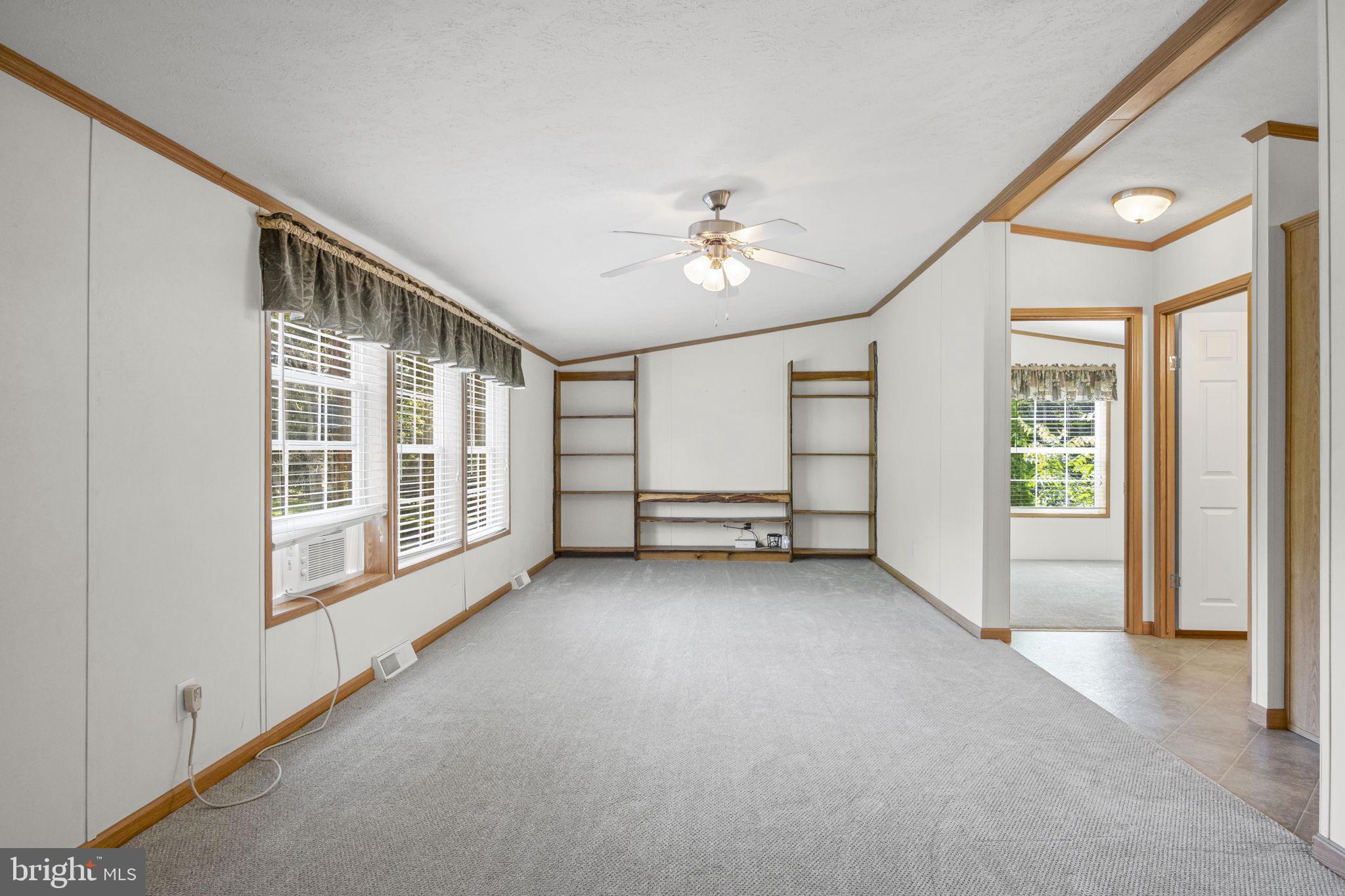 540 Zeigler Road Dover, PA 17315 - Photo 12 of 41 an empty room with windows and ceiling fan