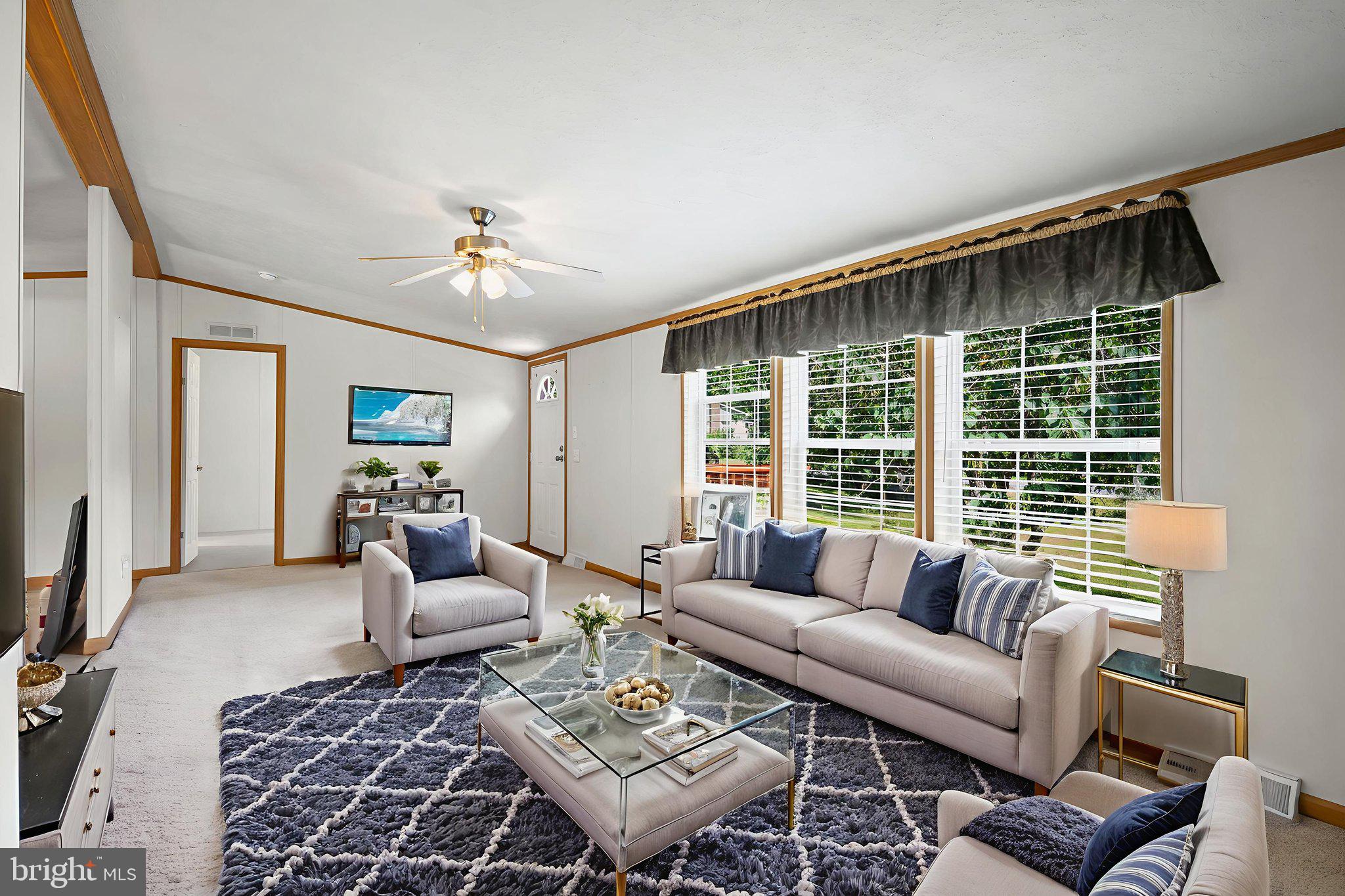540 Zeigler Road Dover, PA 17315 - Photo 16 of 41 a living room with furniture two couches and a flat screen tv