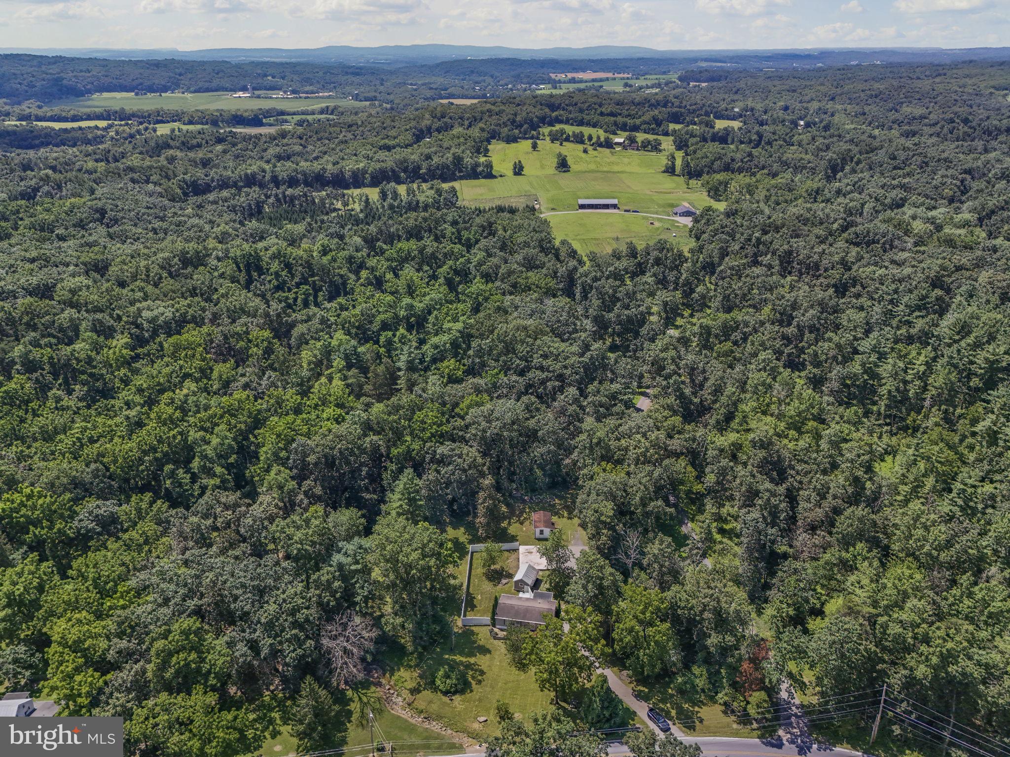 540 Zeigler Road Dover, PA 17315 - Photo 9 of 41 a view of a lake with a city and mountain view
