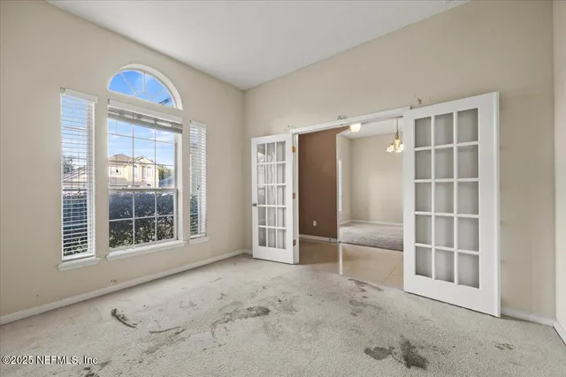 an empty room with windows