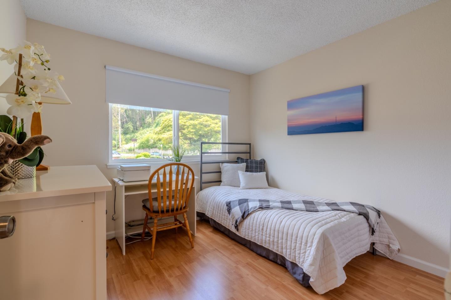 1263 Rosita Road Pacifica, CA 94044 - Photo 27 of 37 a bedroom with a bed and a window