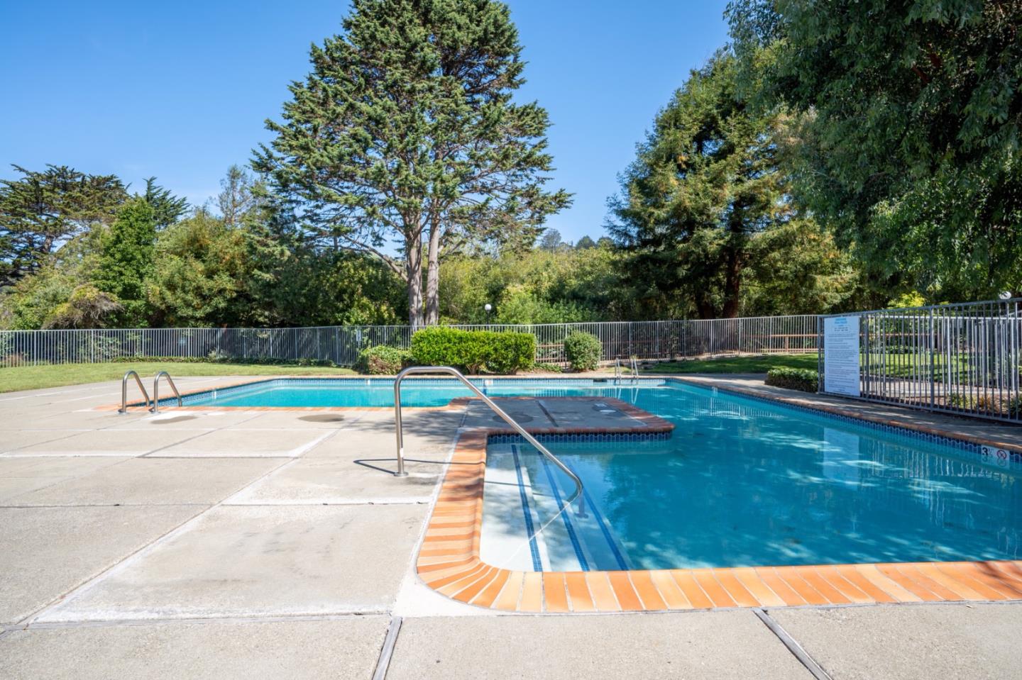 1263 Rosita Road Pacifica, CA 94044 - Photo 34 of 37 a view of a backyard with swimming pool