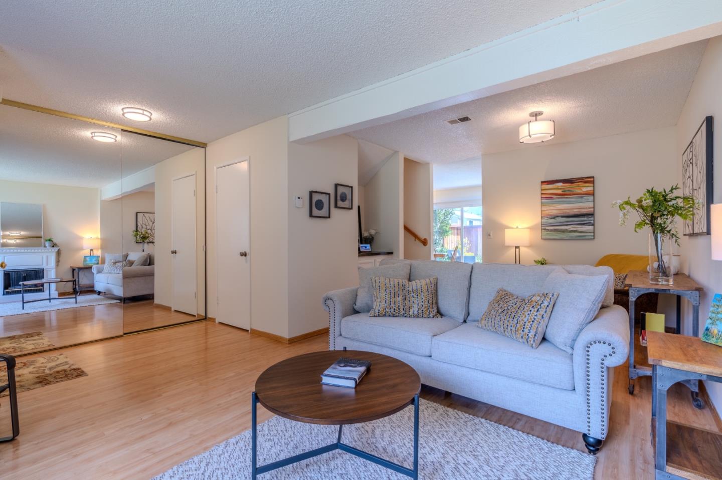 1263 Rosita Road Pacifica, CA 94044 - Photo 4 of 37 a living room with furniture and wooden floor