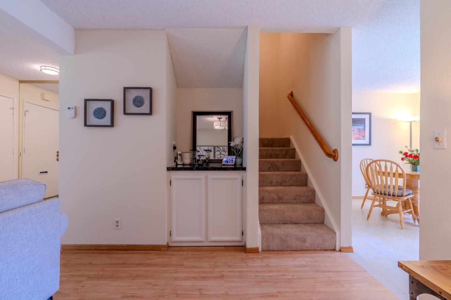 1263 Rosita Road Pacifica, CA 94044 - Photo 7 of 37 a view of entryway and hall with wooden floor