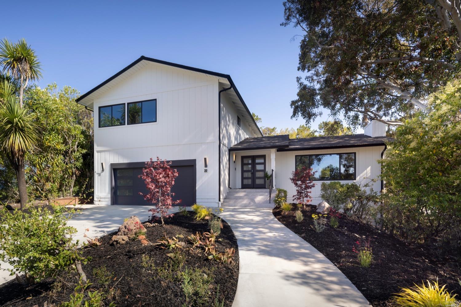 22 Viscaino Way San Rafael, CA 94903 - Photo 1 of 1 a front view of a house with a yard and garage