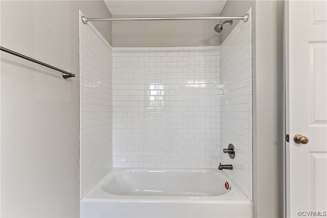 15406 Saddlebrook Road Chesterfield, VA 23838 - Photo 25 of 36 a close up of a bathtub curtain