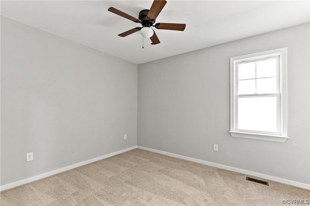 15406 Saddlebrook Road Chesterfield, VA 23838 - Photo 30 of 36 an empty room with a window and a fan