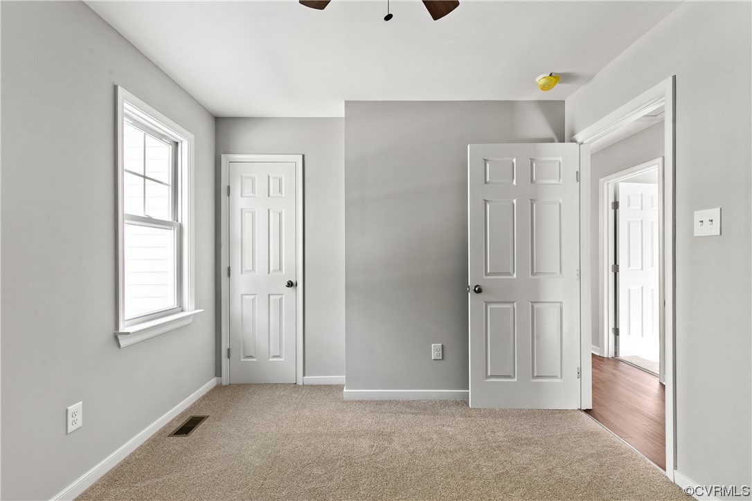 15406 Saddlebrook Road Chesterfield, VA 23838 - Photo 31 of 36 an empty room with windows and closet
