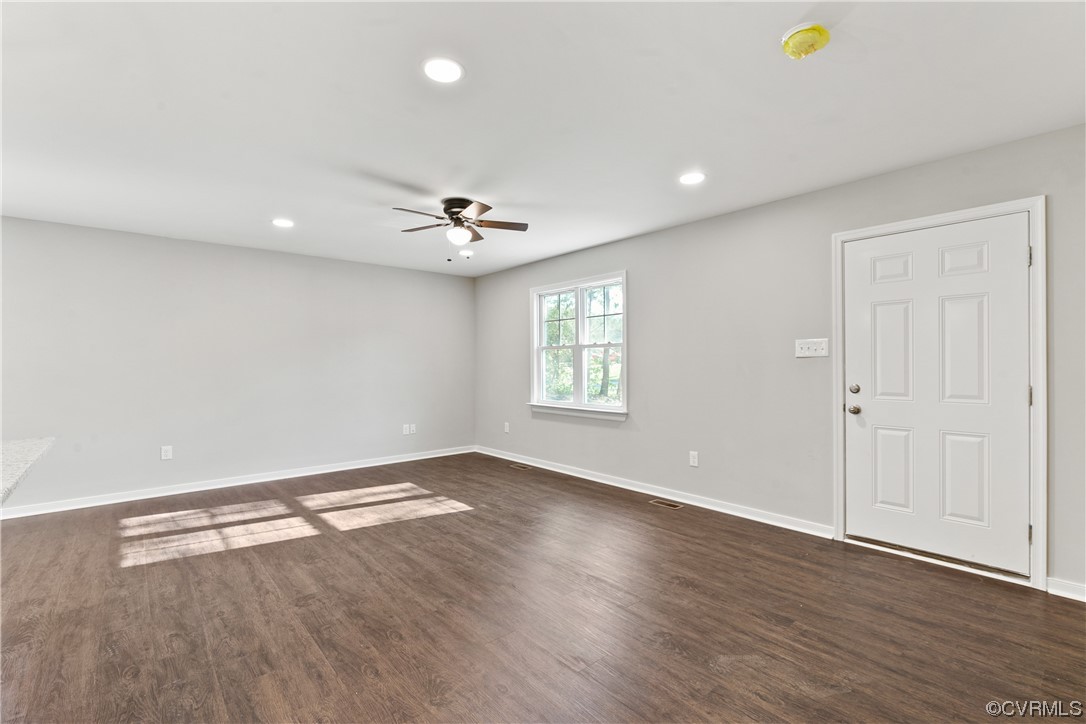 15406 Saddlebrook Road Chesterfield, VA 23838 - Photo 8 of 36 an empty room with wooden floor and windows