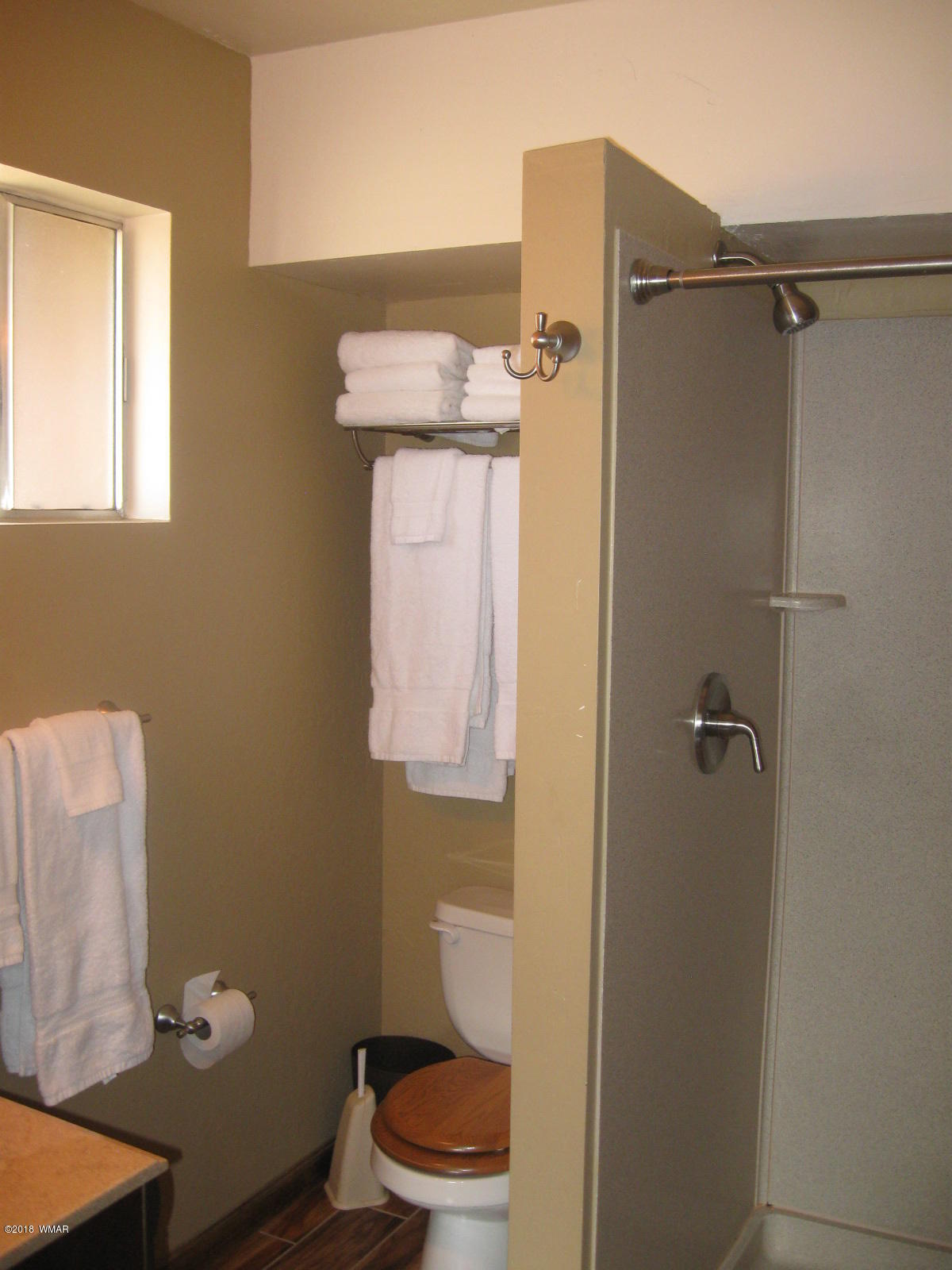 140 Main Street, Unit 4 Greer, AZ 85927 - Photo 19 of 20 a bathroom with a toilet and a shower
