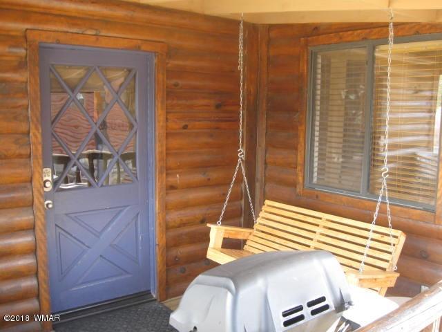 140 Main Street, Unit 4 Greer, AZ 85927 - Photo 7 of 20 a view of a door and chair