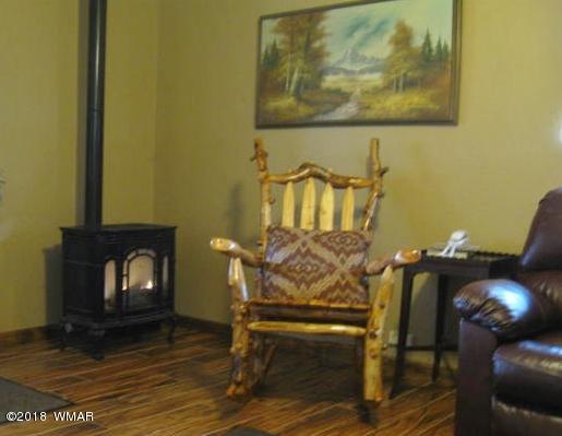 140 Main Street, Unit 4 Greer, AZ 85927 - Photo 9 of 20 a view of a room with furniture and wooden floor