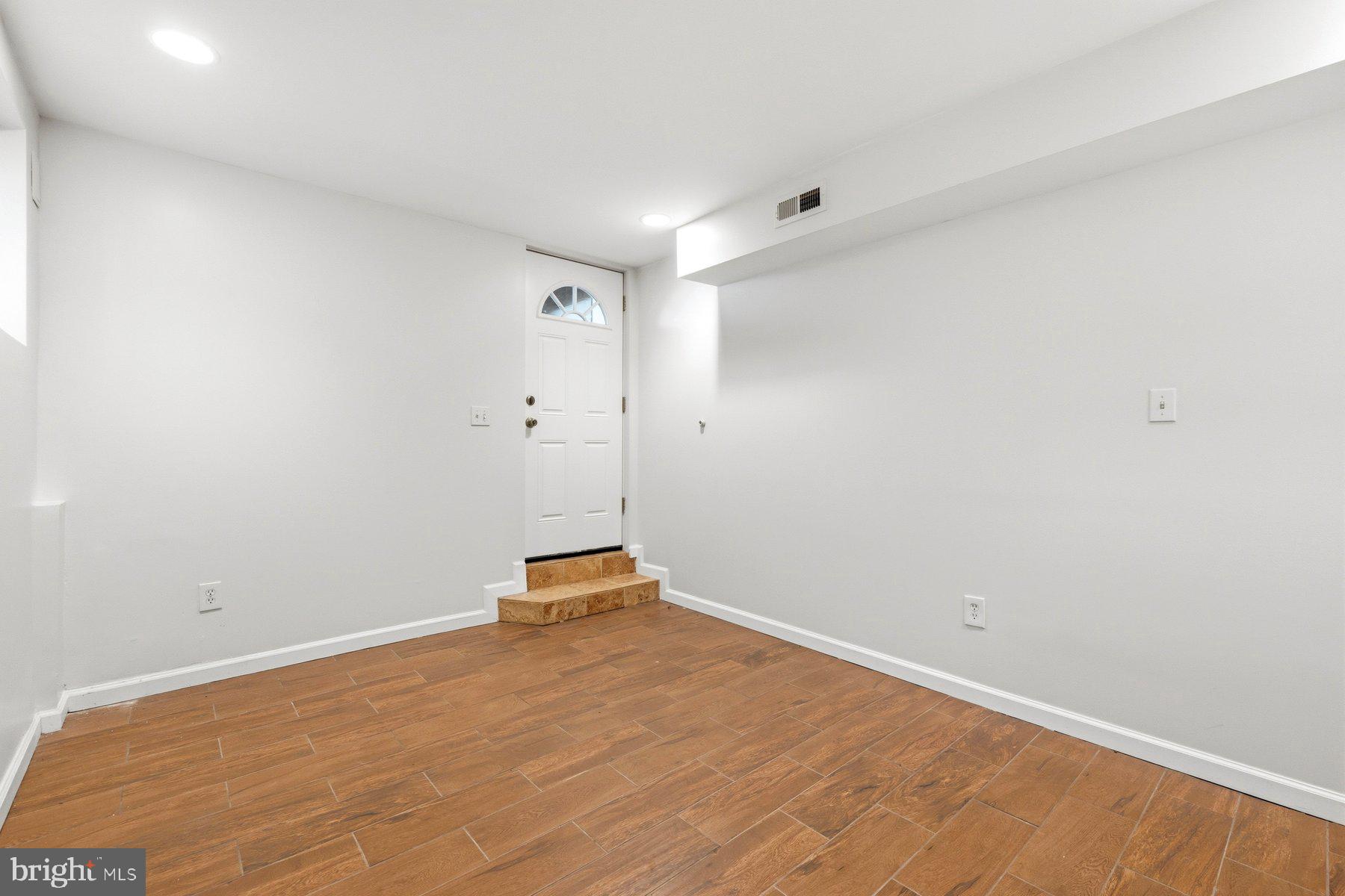 145 Randolph Place Northwest, Unit B Washington, DC 20001 - Photo 11 of 20 a view of a room with wooden floor