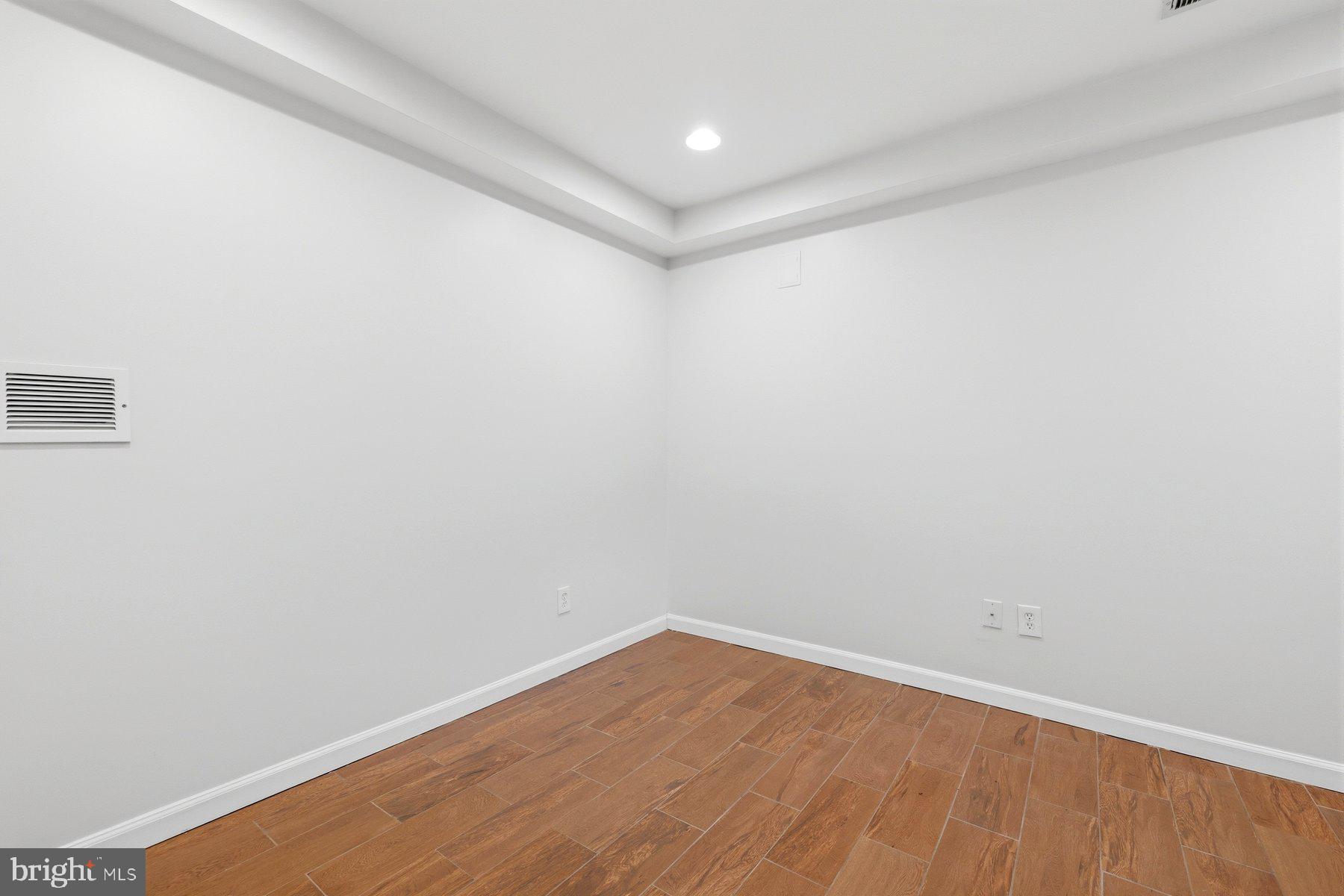 145 Randolph Place Northwest, Unit B Washington, DC 20001 - Photo 12 of 20 a view of an empty room