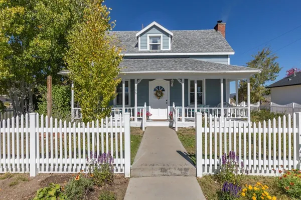 a front view of a house with a porch