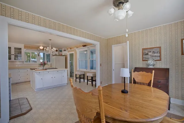a view of a dining room with furniture