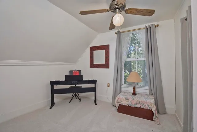 a view of a livingroom with a fan
