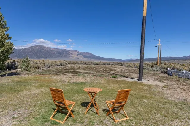 a view of an ocean and a mountain