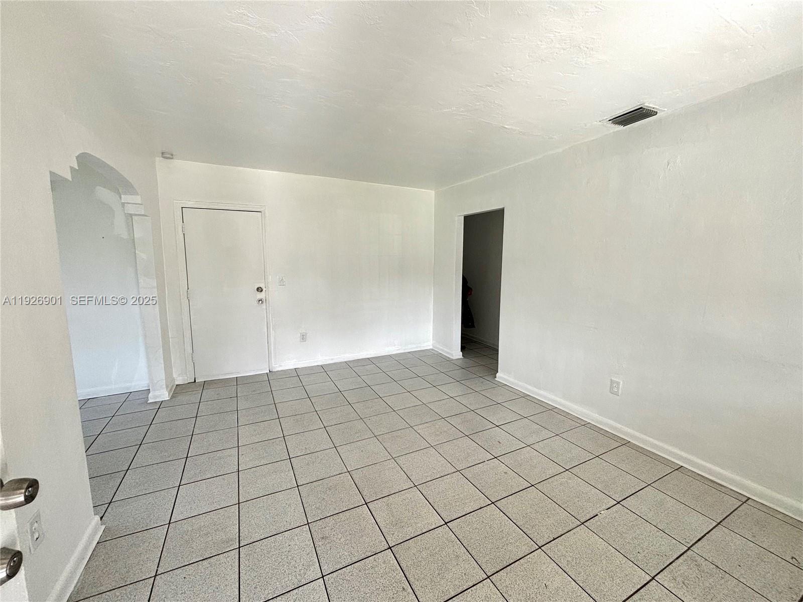 2145 Northwest 64th Street Miami, FL 33147 - Photo 12 of 21 a view of an empty room