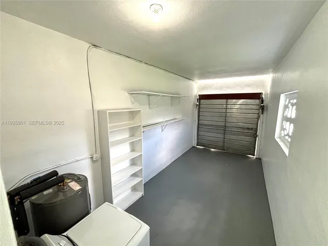 a bathroom with a toilet a sink and bath tub