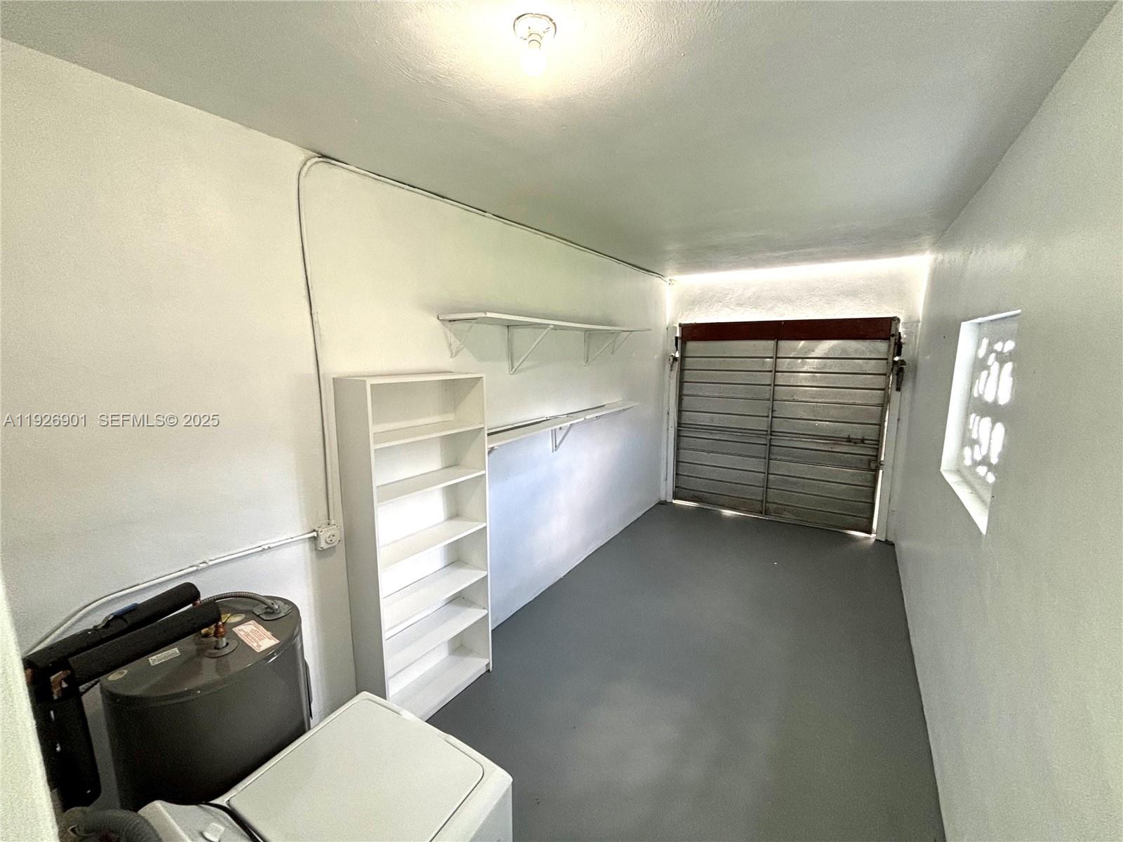 2145 Northwest 64th Street Miami, FL 33147 - Photo 10 of 21 a bathroom with a toilet a sink and bath tub