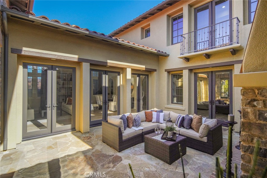 36 Blue Summit Irvine, CA 92603 - Photo 18 of 48 a outdoor living area with furniture and a potted plant