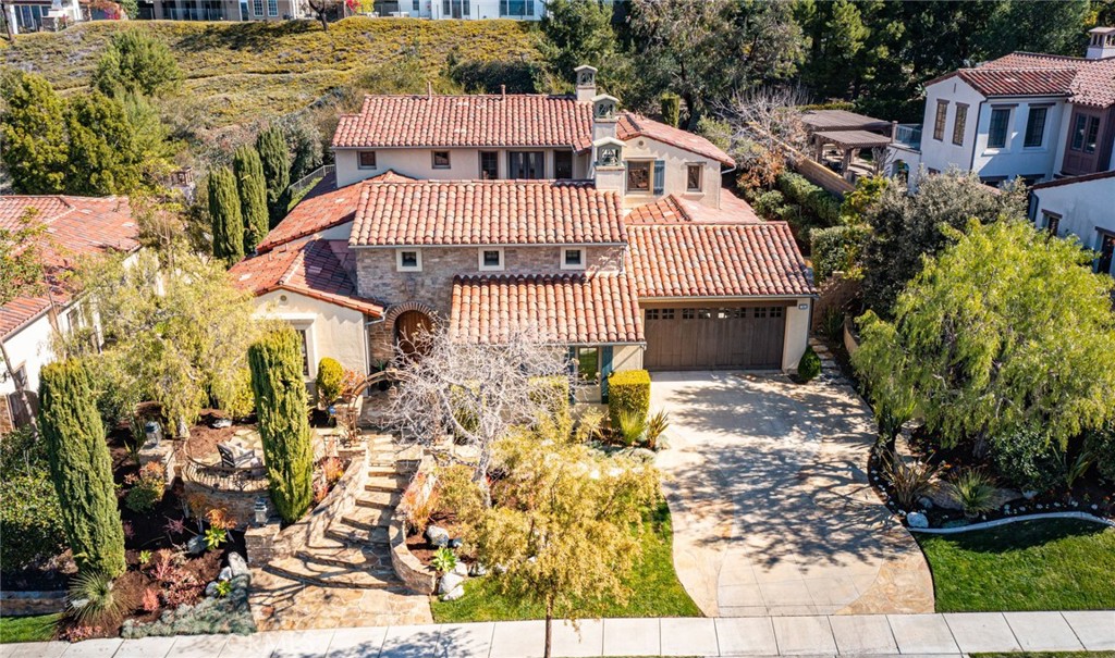 36 Blue Summit Irvine, CA 92603 - Photo 2 of 48 front view of a house with a yard