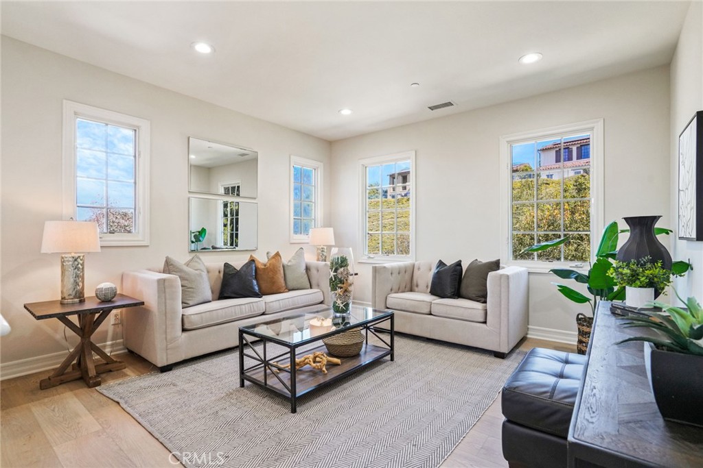 36 Blue Summit Irvine, CA 92603 - Photo 26 of 48 a living room with furniture and a large window