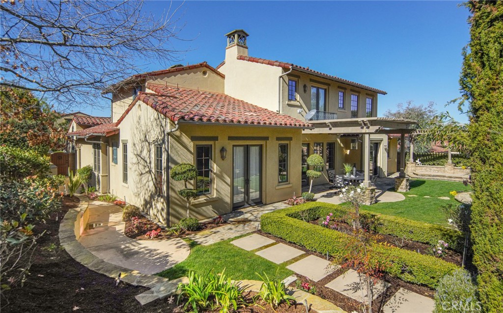 36 Blue Summit Irvine, CA 92603 - Photo 32 of 48 front view of a house with a yard