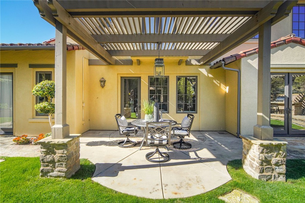 36 Blue Summit Irvine, CA 92603 - Photo 33 of 48 a view of a patio with table and chairs