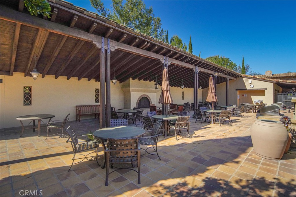 36 Blue Summit Irvine, CA 92603 - Photo 43 of 48 a view of a patio with chairs and tables