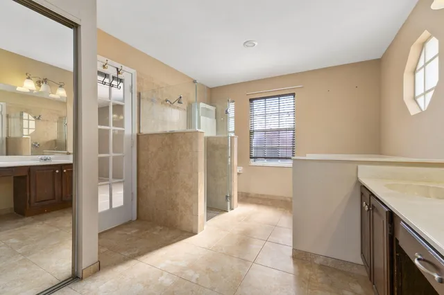 a view of walk in closet with window