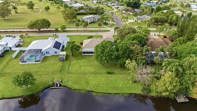 a view of a lake with a yard