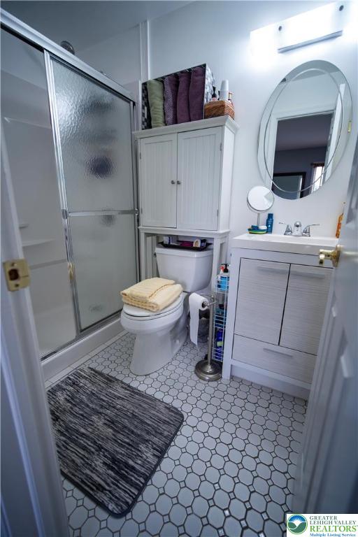 443 Vera Circle, Unit K Bethlehem, PA 18017 - Photo 13 of 24 a bathroom with a sink toilet and shower