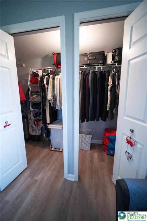 443 Vera Circle, Unit K Bethlehem, PA 18017 - Photo 19 of 24 a view of walk in closet with clothes and shoes
