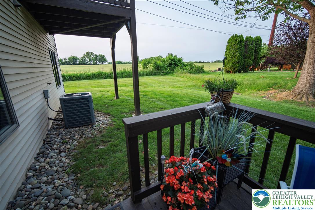 443 Vera Circle, Unit K Bethlehem, PA 18017 - Photo 20 of 24 a view of a two chairs in the garden
