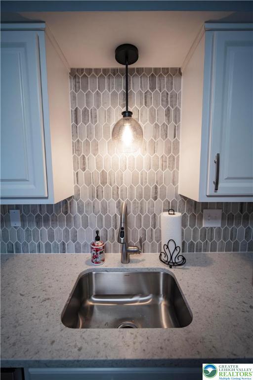 443 Vera Circle, Unit K Bethlehem, PA 18017 - Photo 8 of 24 a kitchen with sink and a granite counter top