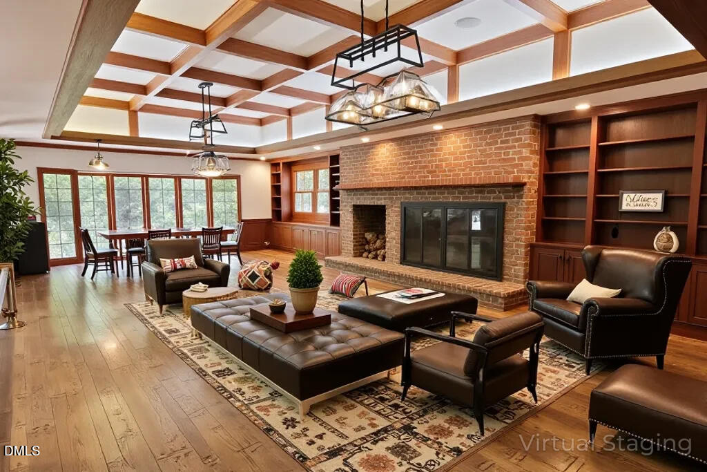 14263 Wyndfield Circle Raleigh, NC 27615 - Photo 23 of 74 a living room with furniture wooden floor and a fireplace