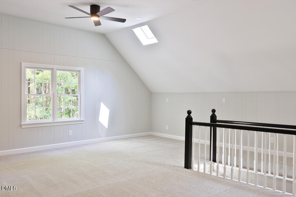 14263 Wyndfield Circle Raleigh, NC 27615 - Photo 66 of 74 an empty room with windows and ceiling fan