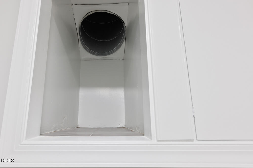 14263 Wyndfield Circle Raleigh, NC 27615 - Photo 74 of 74 a bathroom with a sink and a mirror
