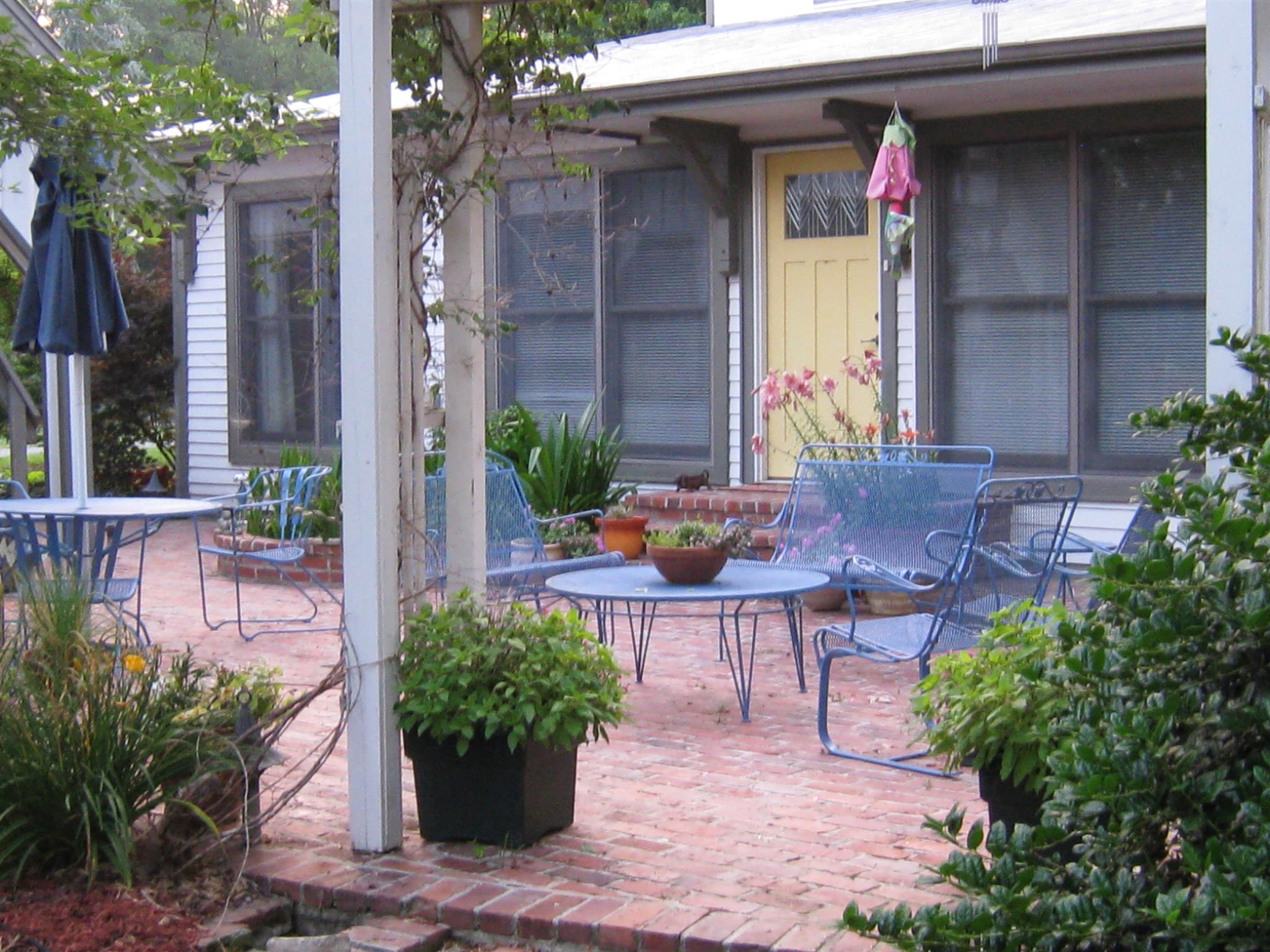 526 Mimosa Road Fayetteville, TN 37334 - Photo 3 of 27 a view of a house with backyard sitting area and garden