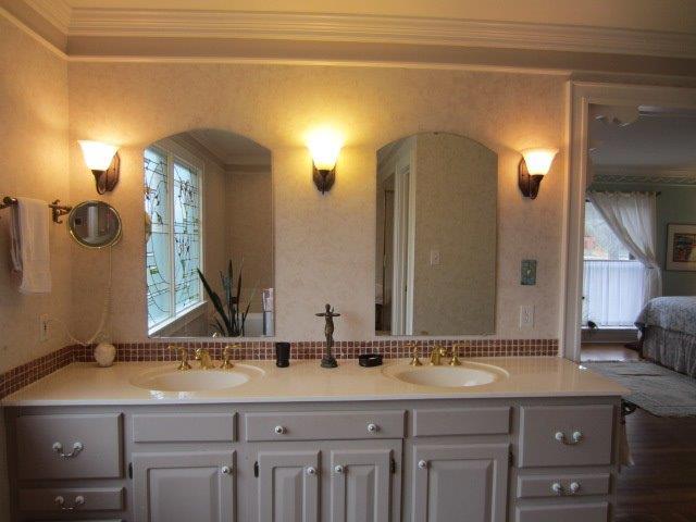 526 Mimosa Road Fayetteville, TN 37334 - Photo 22 of 27 a bathroom with a double vanity sink and a mirror